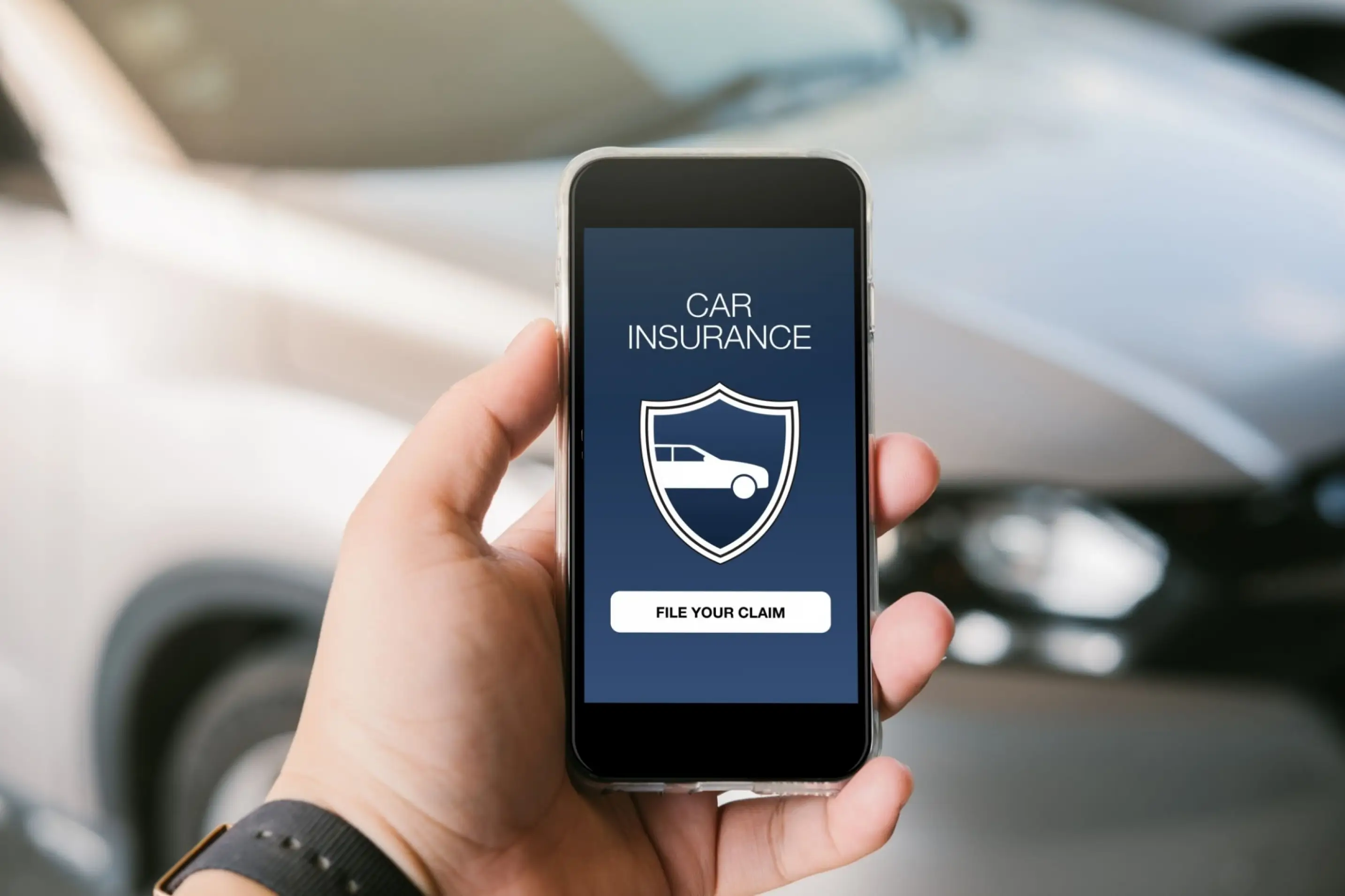 Introduction to Car Insurance - Mobile displaying a car protected with car insurance, your guide to automotive security.
